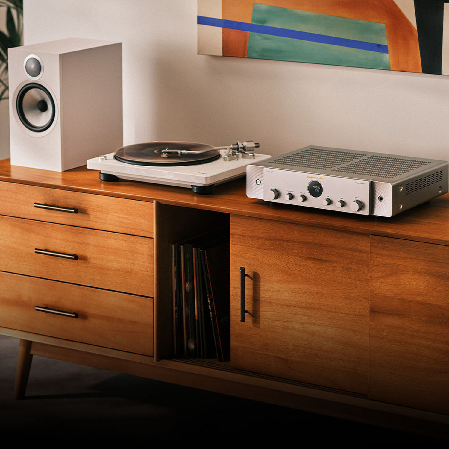 Silver-Gold Model 70 lifestyle image facing left sitting on wooden console
