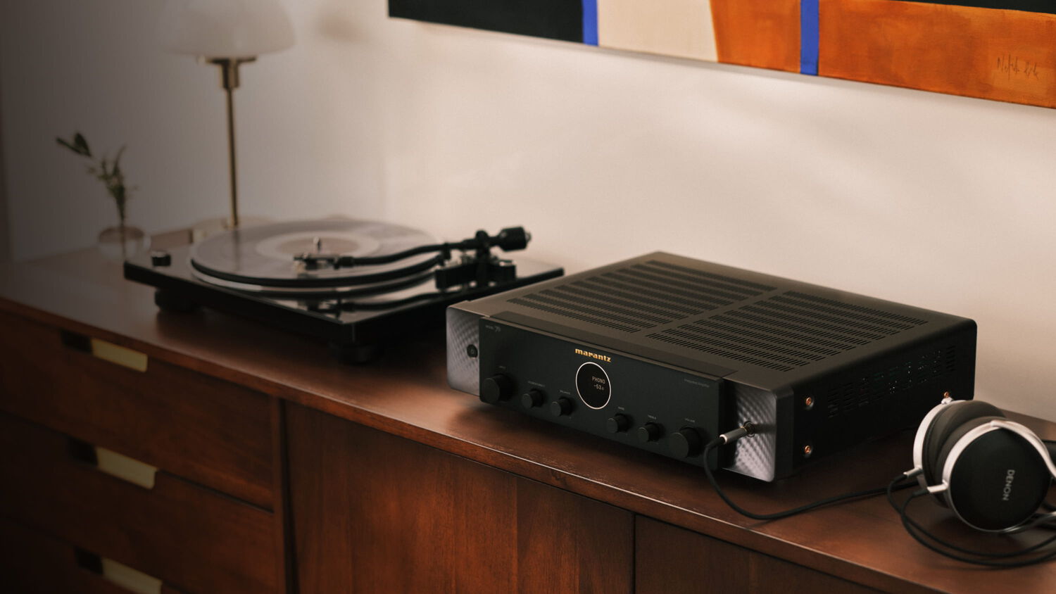 Black Model 70 on wooden console
