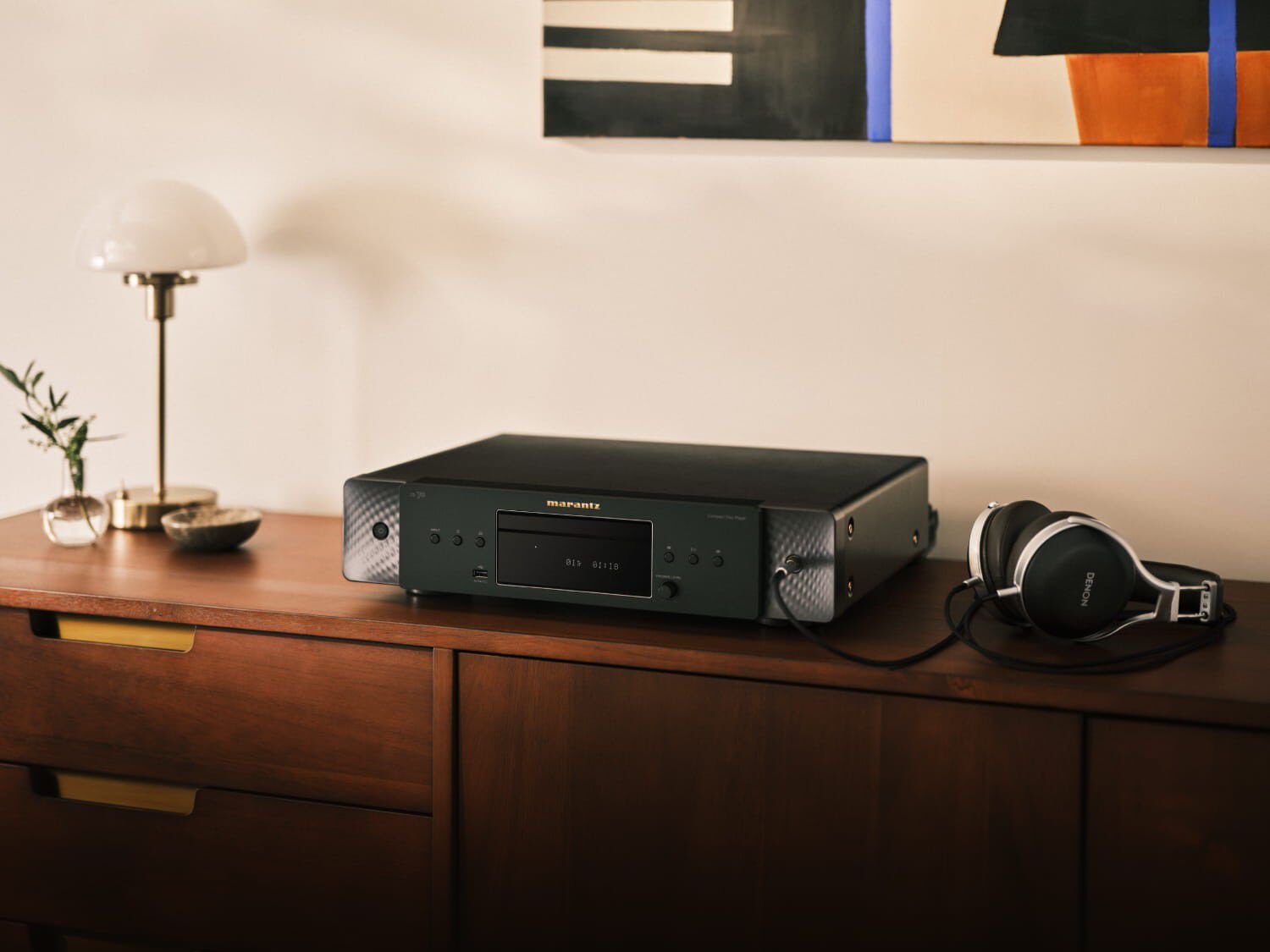 CD 70 Black facing left on dresser with lamp